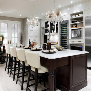 Traditional kitchen photos - Inspiration for a timeless galley kitchen remodel in New York with open cabinets, white cabinets, white backsplash, stainless steel appliances and an island