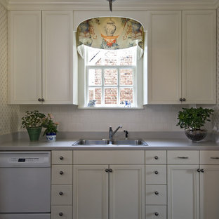 Photo of a traditional kitchen in Richmond with white appliances.