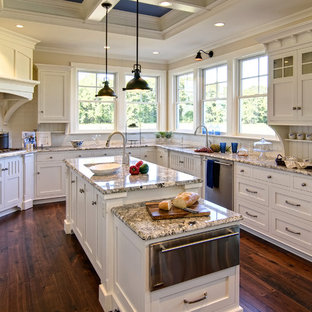 Kitchen - traditional u-shaped kitchen idea in Other with granite countertops, an undermount sink, recessed-panel cabinets, white cabinets, white backsplash, subway tile backsplash and stainless steel appliances
