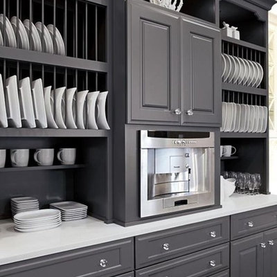 Inspiration for a mid-sized country kitchen remodel in New York with recessed-panel cabinets, gray cabinets, gray backsplash and stainless steel appliances