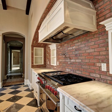 Farmhouse Kitchen with Exposed Brick Wall