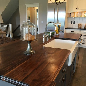 Farmhouse Kitchen with Gray Island and Walnut Countertop