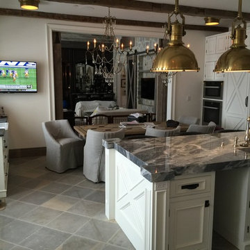 Farmhouse Kitchen with Mounted TV and Audio