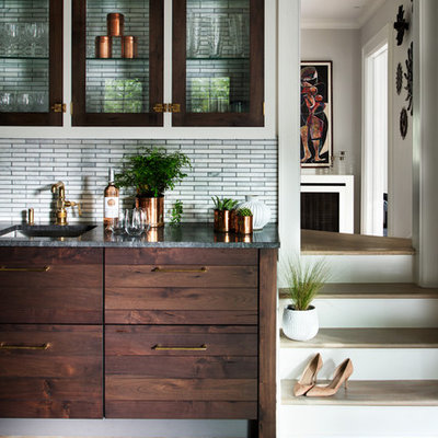 Example of a mid-sized country u-shaped light wood floor and brown floor open concept kitchen design in New York with an undermount sink, shaker cabinets, gray cabinets, granite countertops, gray backsplash, mosaic tile backsplash, colored appliances and an island