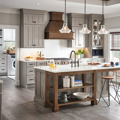 Inspiration for a large farmhouse l-shaped eat-in kitchen remodel in Other with shaker cabinets, gray cabinets and an island