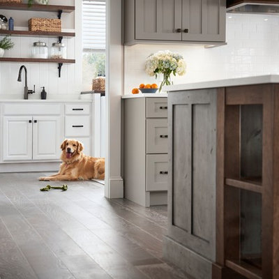 Example of a large cottage l-shaped eat-in kitchen design in Other with shaker cabinets, gray cabinets and an island