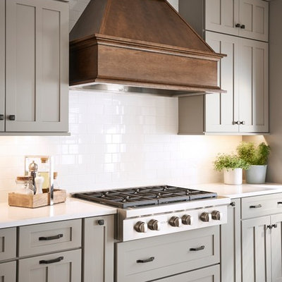 Example of a large farmhouse l-shaped eat-in kitchen design in Other with shaker cabinets, gray cabinets and an island