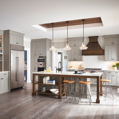 Inspiration for a large farmhouse l-shaped eat-in kitchen remodel in Other with shaker cabinets, gray cabinets and an island