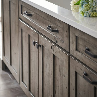 Inspiration for a large cottage l-shaped eat-in kitchen remodel in Other with shaker cabinets, gray cabinets and an island