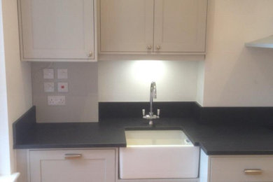 This is an example of a medium sized scandinavian kitchen in London.