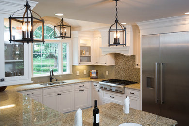 Transitional eat-in kitchen photo in Other with beaded inset cabinets, white cabinets, granite countertops and beige backsplash