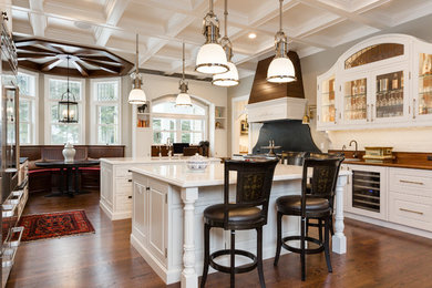 Example of a classic kitchen design in Salt Lake City with a farmhouse sink and two islands