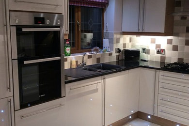 Modern kitchen in West Midlands.