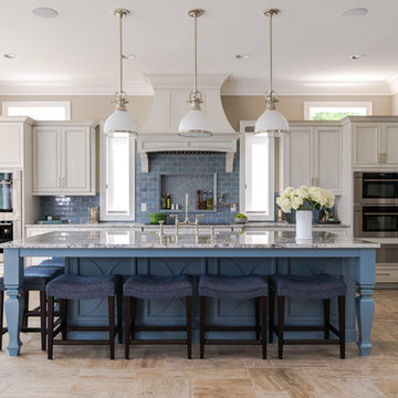 Floor tile: Vein cut Espresso Travertine. Backsplash tile:Sonoma Tilemakers Stel