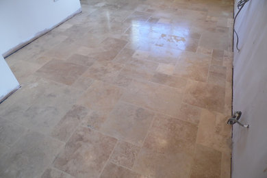 This is an example of a classic kitchen/diner in Other with limestone flooring.