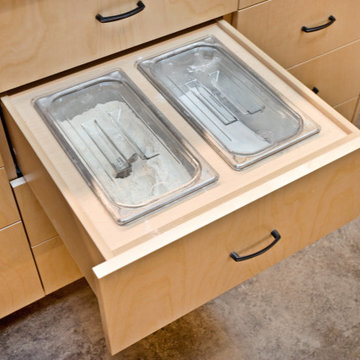 Flour and sugar bins in lower cabinet drawer