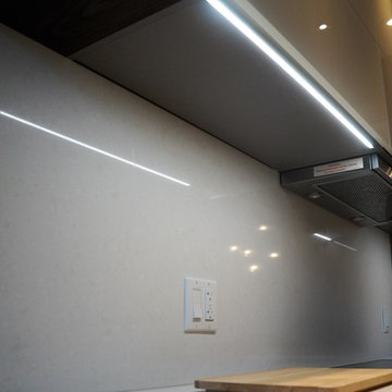 Flush integrated LED under-cabinetry lights of Modern Kitchen