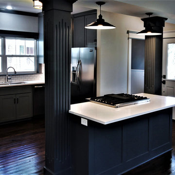 Fluted Pilasters Flank the Kitchen Island