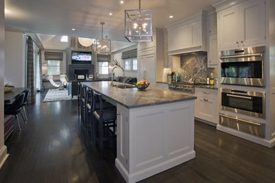 Inspiration for a dark wood floor kitchen remodel in New York with stainless steel appliances