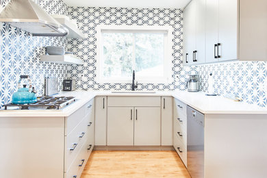 Mid-sized trendy kitchen photo in Edmonton
