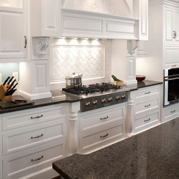 Formal white kitchen with blue island - Mullet Cabinet