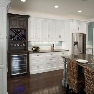 Formal white kitchen with blue island - Mullet Cabinet