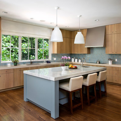 Kitchen - transitional kitchen idea in San Francisco with mosaic tile backsplash, stainless steel appliances, blue backsplash, flat-panel cabinets and medium tone wood cabinets