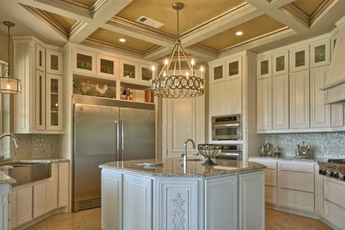 Kitchen pantry - huge eclectic u-shaped porcelain tile kitchen pantry idea in Dallas with a farmhouse sink, raised-panel cabinets, white cabinets, granite countertops, gray backsplash, glass tile backsplash, stainless steel appliances and an island