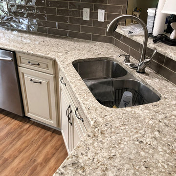 From standard  builder's to beautifully  cabinets, tops and splash!