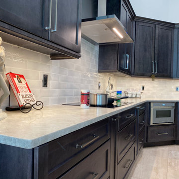 Full Kitchen Remodel Featuring Gray Cabinets and Quartzite countertop