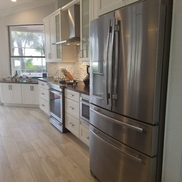 Full Kitchen Remodel Featuring White Cabinets, Quartzite and Granite Countertops