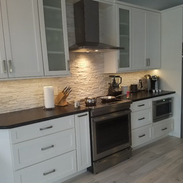 Full Kitchen Remodel Featuring White Cabinets, Quartzite and Granite Countertops