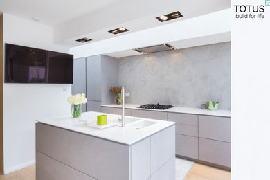 Design ideas for a modern kitchen in Surrey.