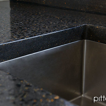 fully exposed & sculpted concrete benchtop, undermount sink, concrete splashback