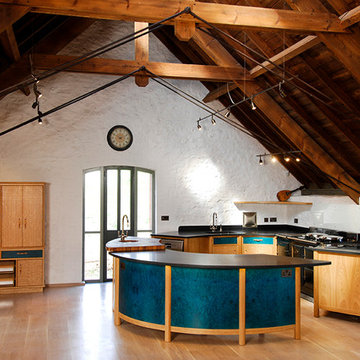 Funky contemporary kitchen in listed Barn Conversion