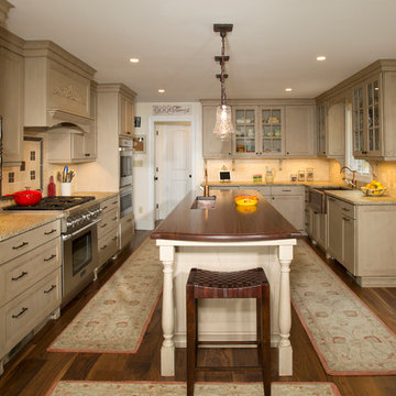Galley-style kitchen with island in Olney, MD