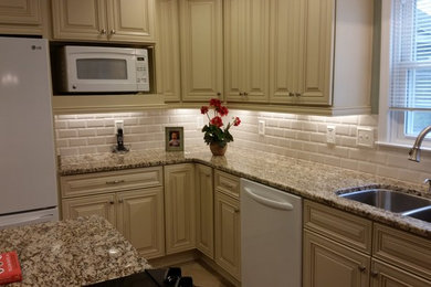 Example of an ornate kitchen design in Atlanta