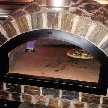 Gas burner for wood-fired oven