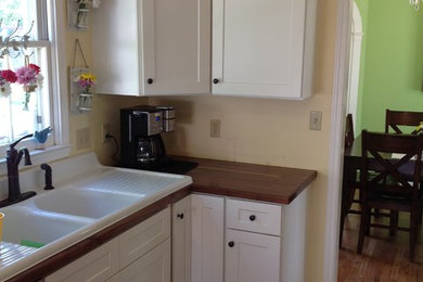 Inspiration for a kitchen remodel in Other with shaker cabinets and white cabinets