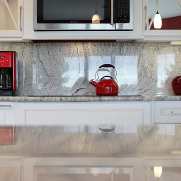 Geneseo, IL- Painted White Kitchen With Mirrored Cabinets and Full-Height Splash