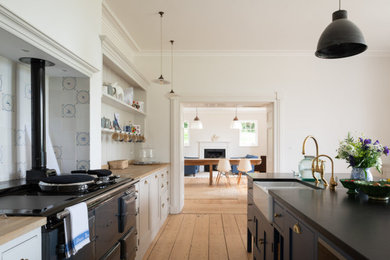 This is an example of a classic kitchen in Sussex.