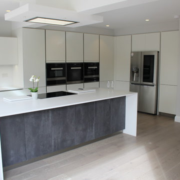 German True Handleless Kitchen In white lacquered Doors and Concrete Effect