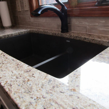 Giallo Ornamental granite with a Blanco cafe brown sink