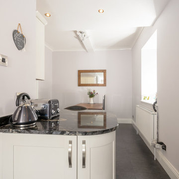 Give a traditional kitchen a modern twist with dramatic black accessories