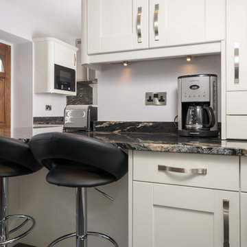 Give a traditional kitchen a modern twist with dramatic black accessories