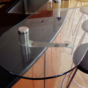 Glass countertop with custom stainless supports