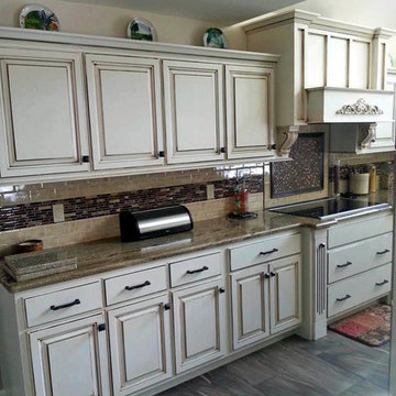 Glazed Kitchen Cabinets with Granite Countertops and Subway tile