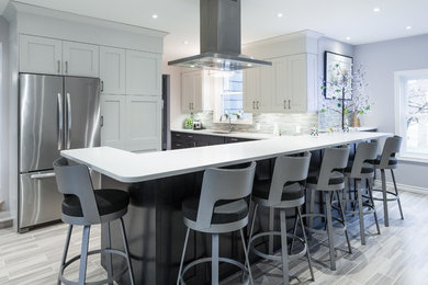 Inspiration for a mid-sized contemporary u-shaped porcelain tile and gray floor open concept kitchen remodel in Other with an undermount sink, shaker cabinets, white cabinets, solid surface countertops, multicolored backsplash, matchstick tile backsplash, stainless steel appliances and an island