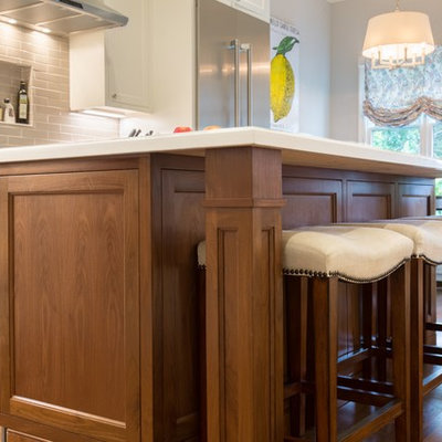 Example of a classic medium tone wood floor kitchen design in San Francisco