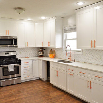 Goshen, IN. BaileyTown USA Select. White Kitchen with Rose Gold Accents